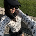 Alo Yoga white printed long-sleeved top