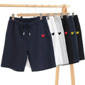 Comme des Gar?ons Play jogger shorts