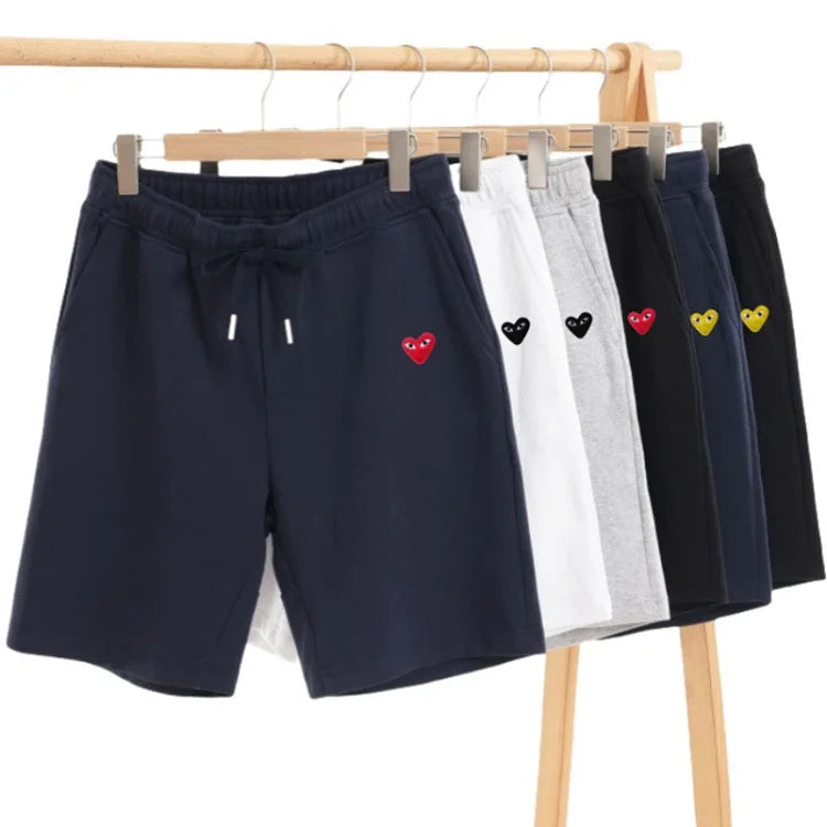 Comme des Gar?ons Play jogger shorts