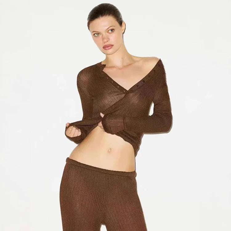 Brown SKIMS tulle knit button-down top and matching knit trousers