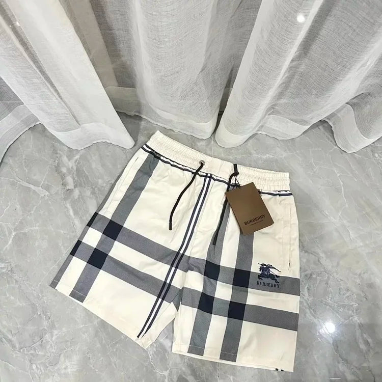Burberry cream-colored plaid shorts