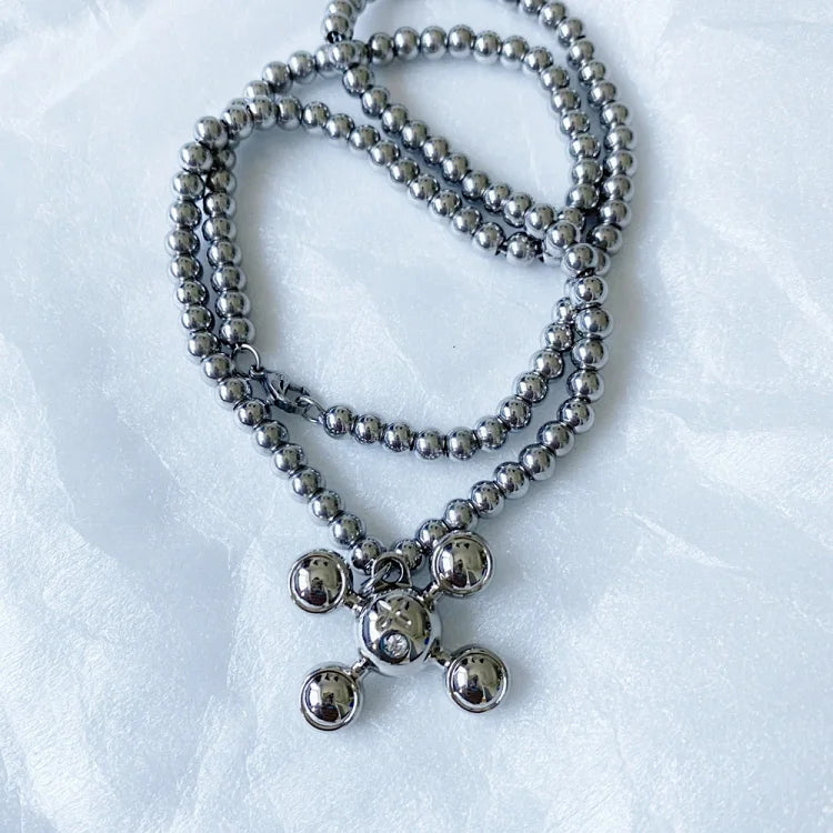 Four-claw quadrilateral spherical pendant