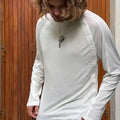 White long-sleeved shirt from No Faith Studios