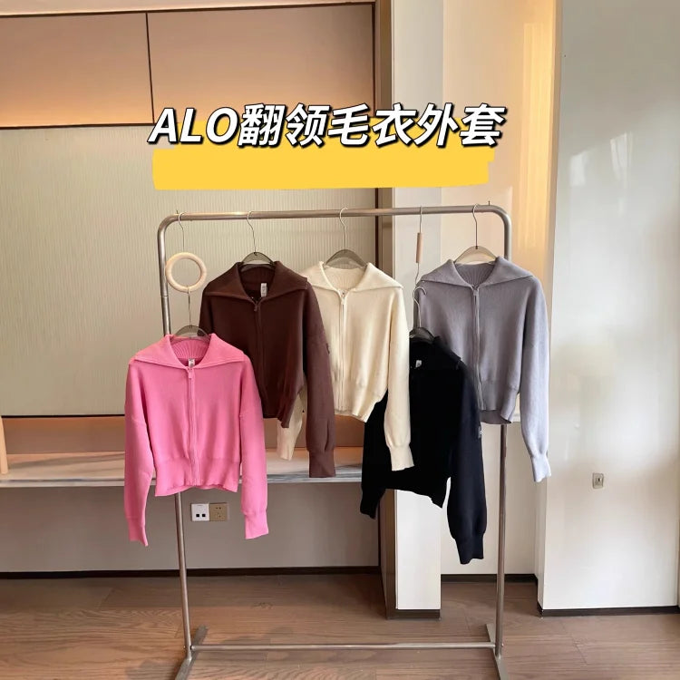 Bright pink Alo Yoga zip-up sweater