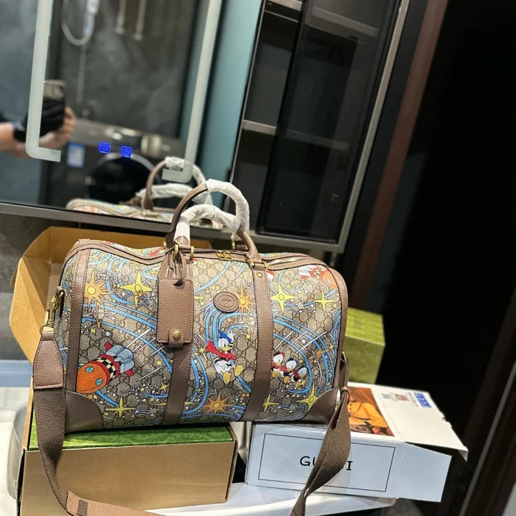 Gucci Disney x Donald Duck GG Supreme Canvas Travel Bag
