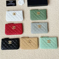 Green Chanel quilted caviar leather card holder