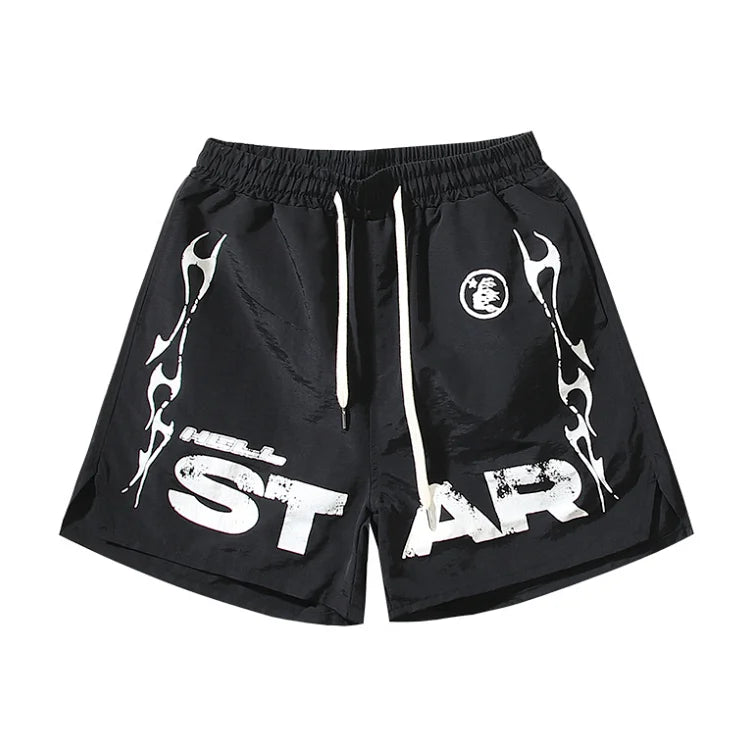 Hellstar Studios black flame-patterned shorts