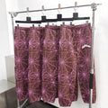 Sp5der brand brown and pink printed sweatpants