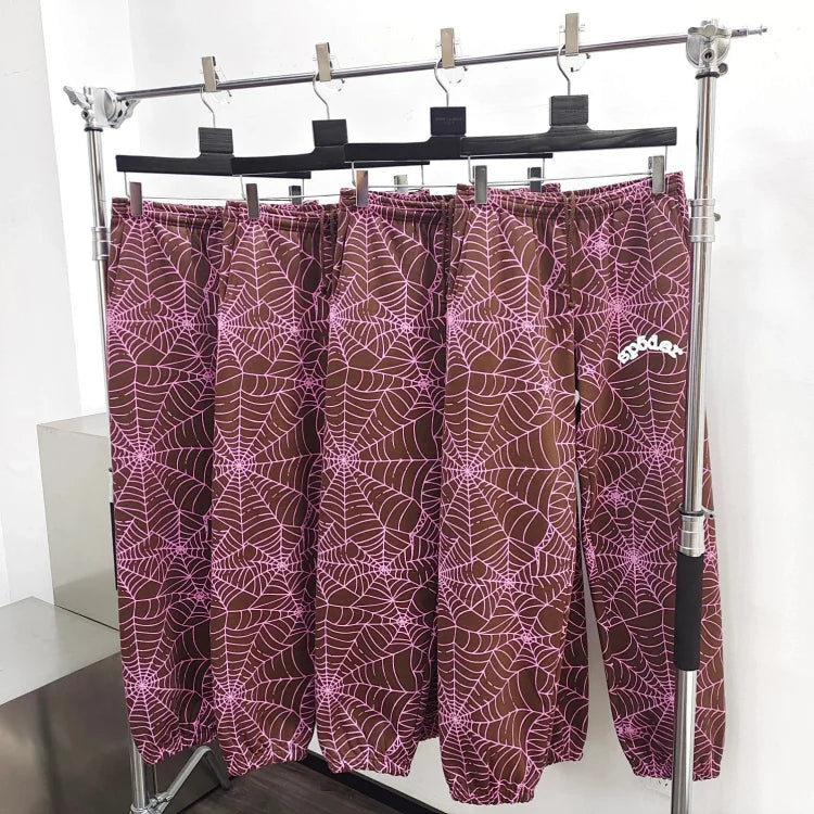 Sp5der brand brown and pink printed sweatpants
