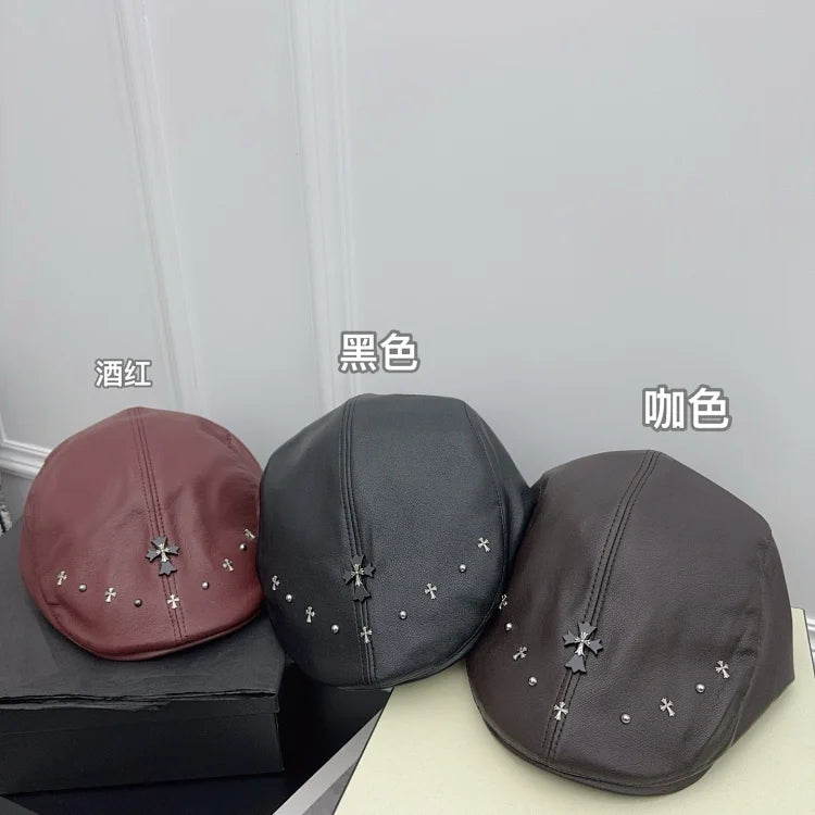 Cross-studded burgundy leather beret
