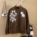A brown bomber jacket from Chrome Hearts