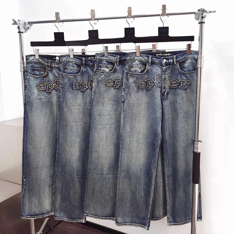 Sp5der light blue washed spray-painted jeans