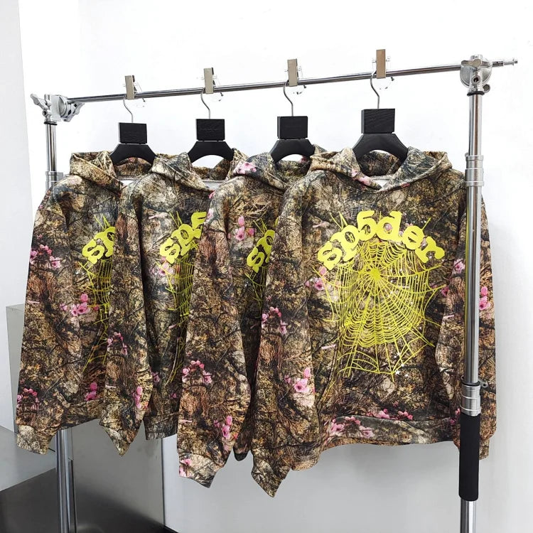 A Real Tree OG Web Camo hoodie from sp5der.