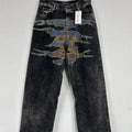 Y/Project's   Paris Best   series of black washed distressed jeans