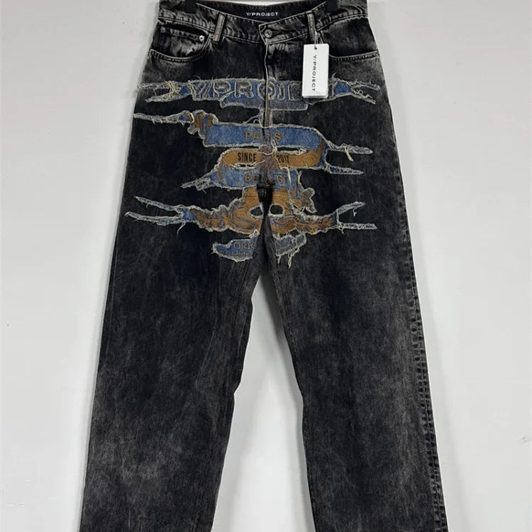 Y/Project's   Paris Best   series of black washed distressed jeans