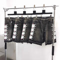 Sp5der Web Stone black washed denim shorts.