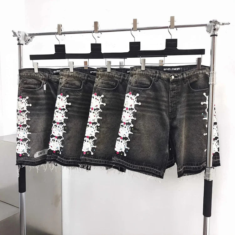 Sp5der Web Stone black washed denim shorts.