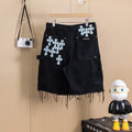 Black denim shorts with cross patch from Chrome Hearts
