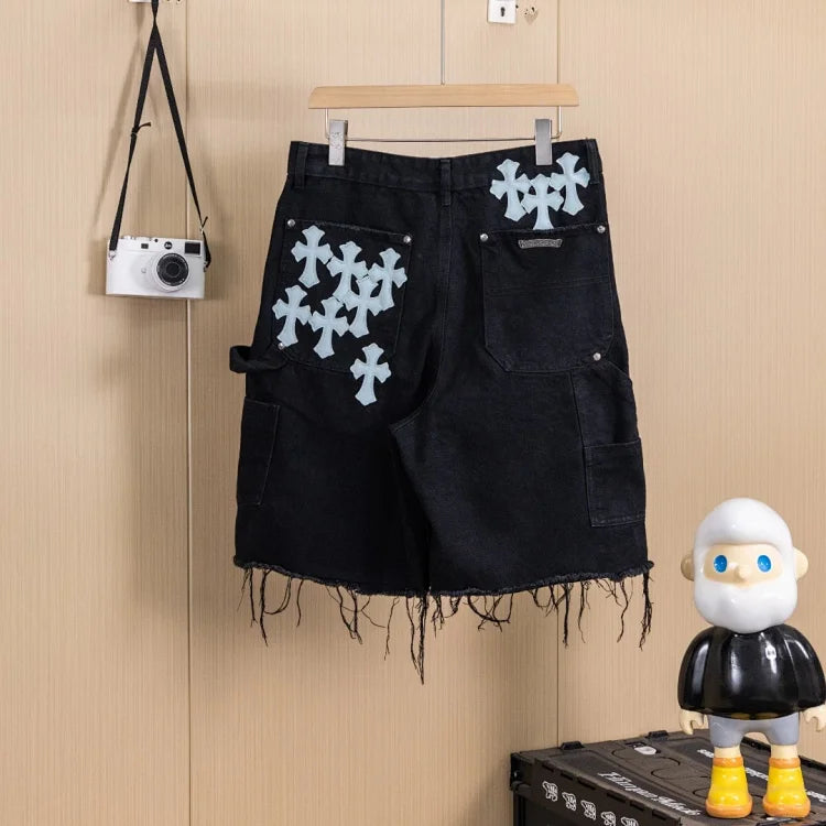 Black denim shorts with cross patch from Chrome Hearts