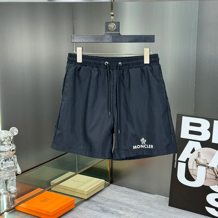 Moncler black logo patch swim trunks