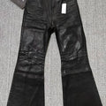 Black waxed flared jeans