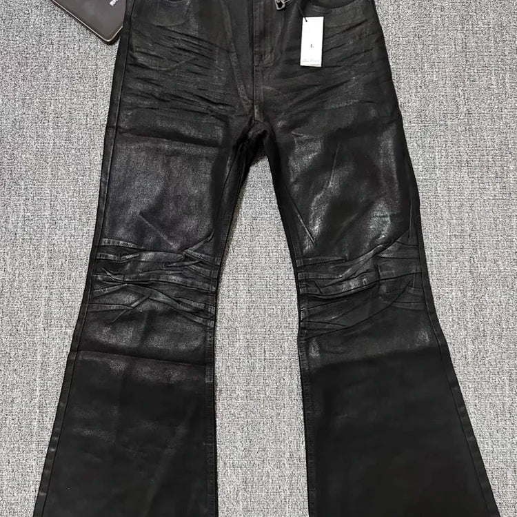 Black waxed flared jeans