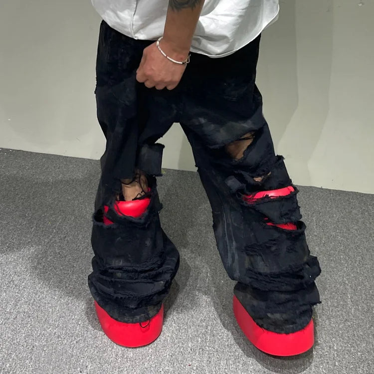 Balenciaga Ripped Mud Jeans