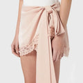 This is a Blumarine ribbed mini skirt in silver pink.