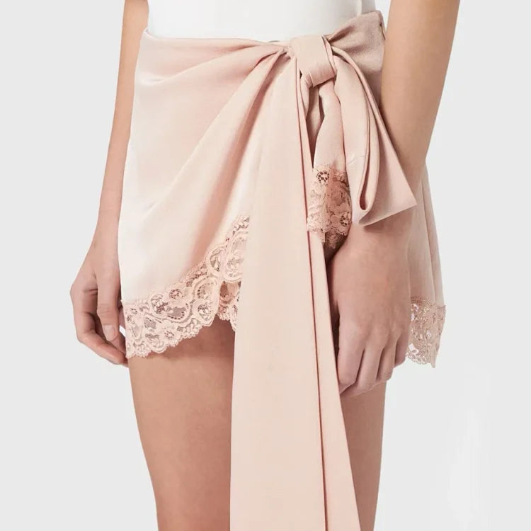This is a Blumarine ribbed mini skirt in silver pink.
