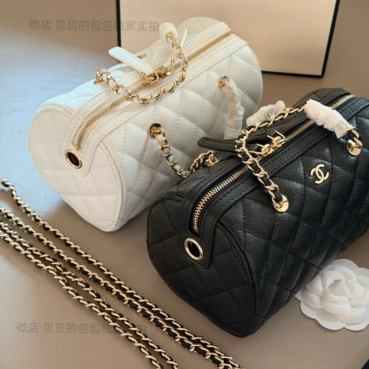 Chanel's classic black bowling bag in pebbled leather.