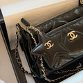 Chanel Coco Neige 2025/26 collection black glossy wrinkled calfskin chain handbag