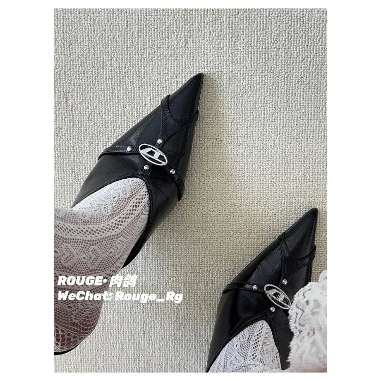 A pair of black Diesel D-Electra stiletto mules
